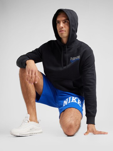 Loosefit Pantalon 'CLUB' Nike Sportswear en bleu