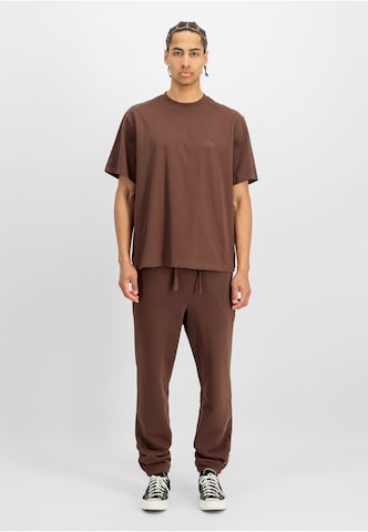 ALPHA INDUSTRIES Tapered Pants 'DTM' in Brown