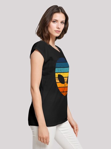 T-shirt 'Alien Sonnenuntergang Retro' F4NT4STIC en noir