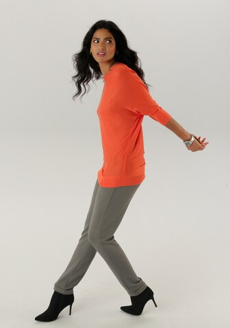 Aniston SELECTED Pullover in Orange