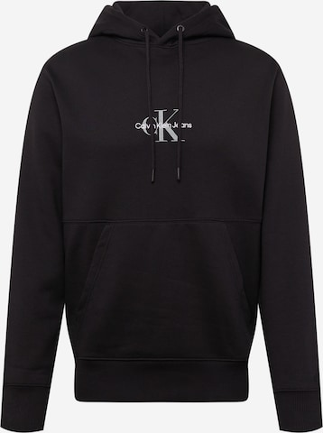 Sweat-shirt Calvin Klein en noir : devant