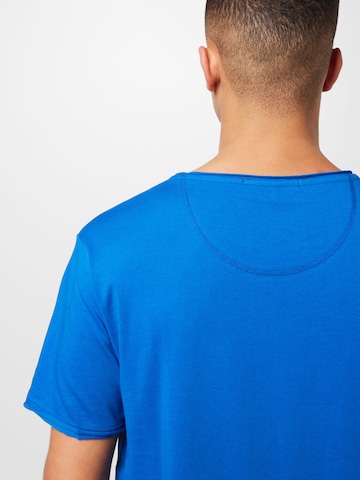 DRYKORN T-shirt 'Kendrick' i blå