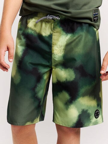 PROTEST Badeshorts 'PRTEmil JR'‌ in Grün