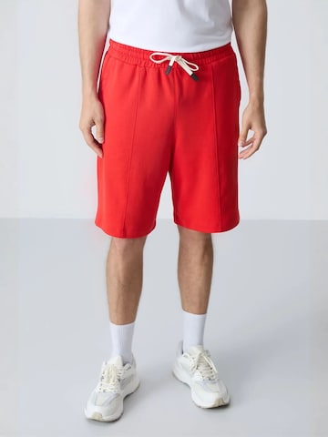 Tommy Life - Regular Calças de desporto em vermelho