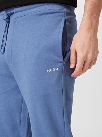 HUGO Zwężany krój Spodnie 'Dayote' w kolorze niebieski