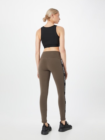 GUESSSkinny Sportske hlače 'ALINE' - smeđa boja