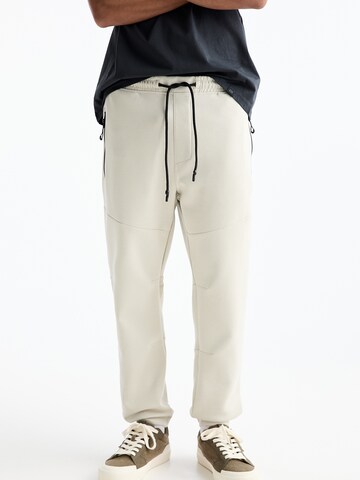 Tapered Pantaloni di Pull&Bear in beige: frontale