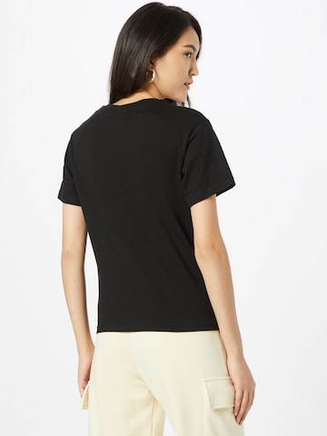 WEEKDAY T-shirt 'Alanis' i svart