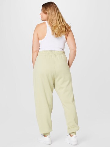 Public Desire Curve Tapered Jogginghose in Beige