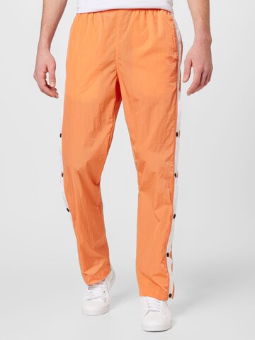 Loosefit Pantalon Tommy Jeans en orange : devant