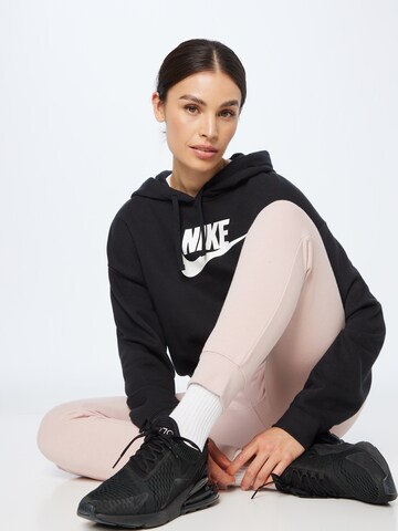 rožinė Nike Sportswear Prigludęs Kelnės