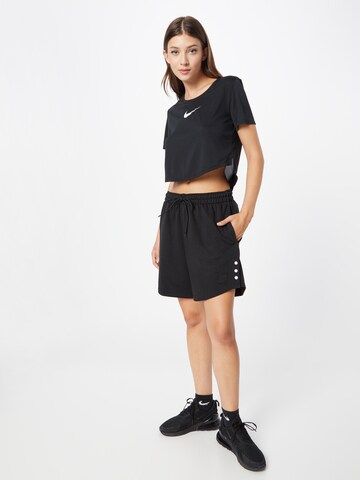 NIKE - Camiseta funcional en negro