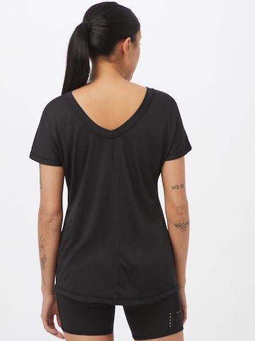 PUMA Funkční tričko – černá