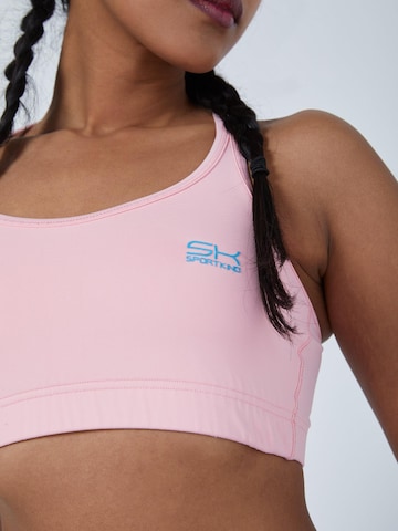 SPORTKIND BH 'Crossed Straps' in Pink