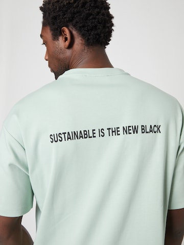 T-Shirt ABOUT YOU x Louis Darcis en vert