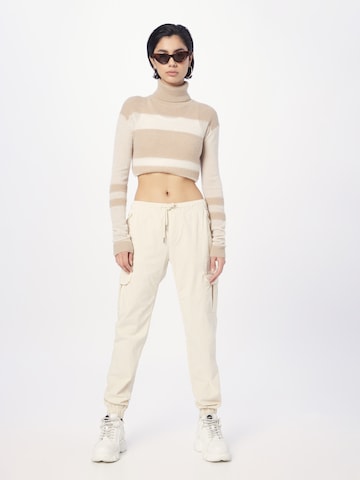 Tapered Pantaloni cargo di Urban Classics in bianco