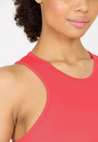 Athlecia Sports top 'Almi' in Orange