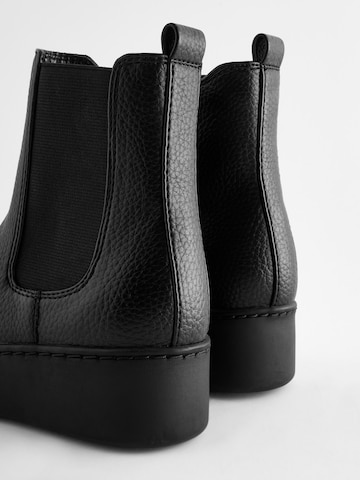 Bottes Next en noir