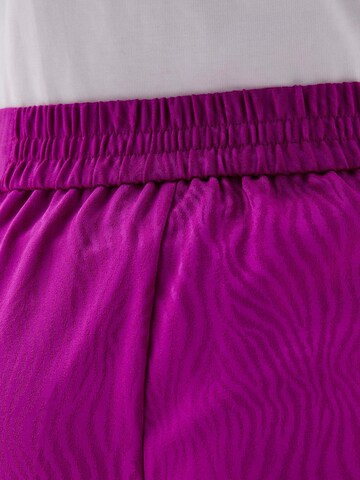 Scalpers Flared Pants in Pink