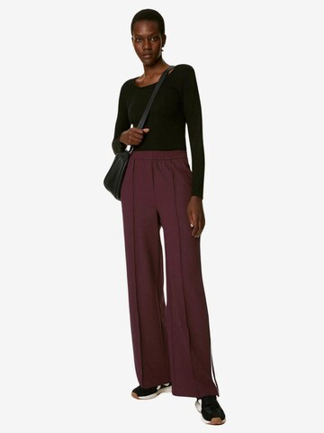 Wide leg Pantaloni di Marks & Spencer in rosso