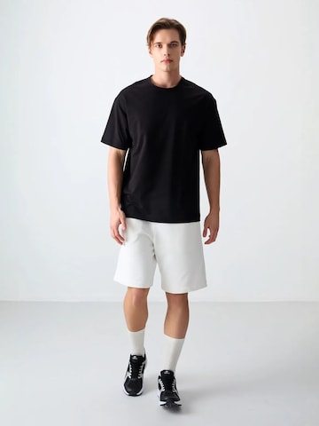 Tommy Life T-Shirts in Schwarz