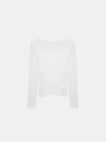 Maglietta di Dilvin in bianco