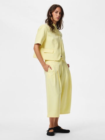 Loosefit Pantaloni 'PCOlivia' di PIECES in giallo