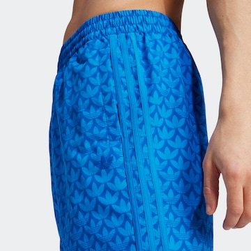 ADIDAS ORIGINALS Kratke kopalne hlače 'Monogram' | modra barva