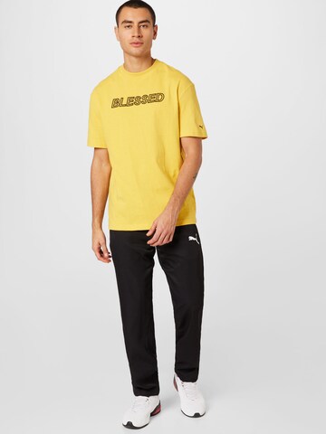 T-Shirt 'PUMA x NJR' PUMA en jaune