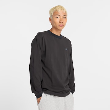 new balance Funktionsshirt 'Athletics' in Schwarz: Vorderseite