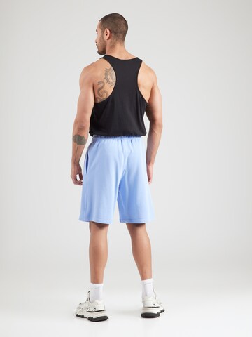 Champion Authentic Athletic Apparel Loose fit Trousers in Blue