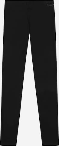Calvin Klein Jeans Skinny Legíny – černá