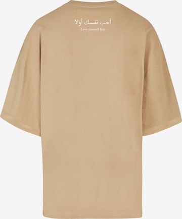 T-Shirt 'Love Yourself First' Merchcode en beige