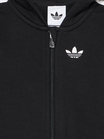 juoda ADIDAS ORIGINALS Kombinezonas 'Onesie'