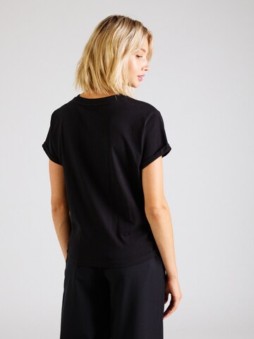Maglia funzionale di DKNY Performance in nero