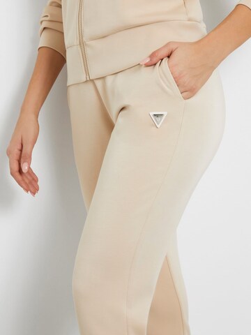 GUESS Regular Workout Pants in Beige