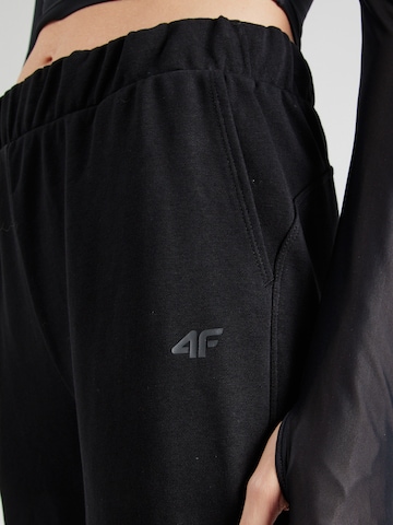 Effilé Pantalon de sport 4F en noir