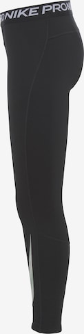 NIKESkinny Sportske hlače 'Pro Warm' - crna boja