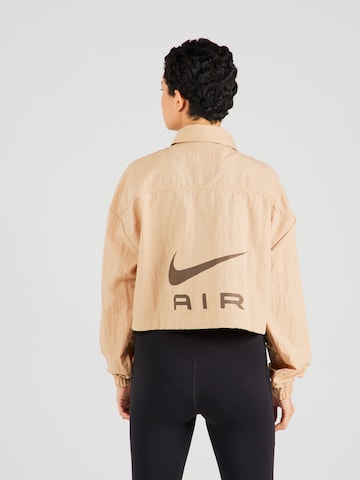 Nike Sportswear Prehodna jakna 'AIR' | bež barva