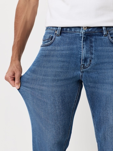 zils Next Standarta Džinsi 'Motionflex'