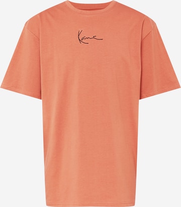 T-Shirt Karl Kani en orange : devant