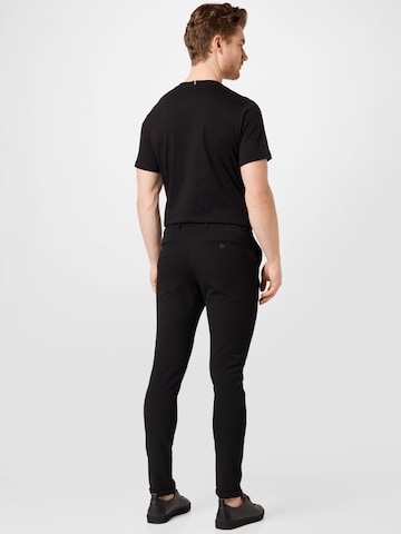 Coupe slim Pantalon chino 'Como' Les Deux en noir