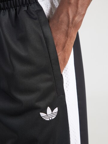ADIDAS ORIGINALS Baggy Housut värissä musta