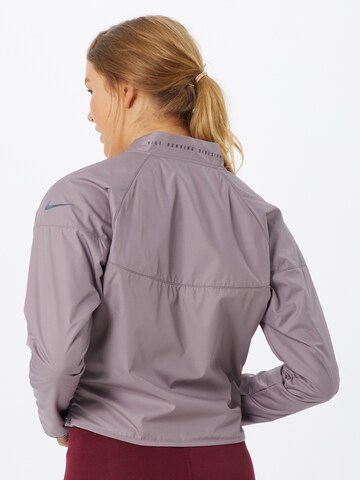 NIKE - Chaqueta deportiva 'Division' en lila