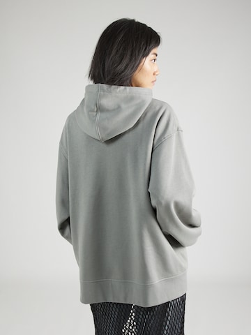 Sweat-shirt 'Essence' WEEKDAY en gris