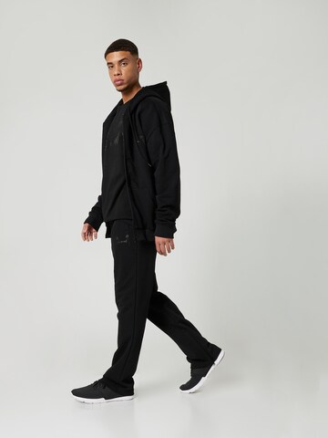 Sinned x ABOUT YOU Regular Trousers 'CURT' in Black