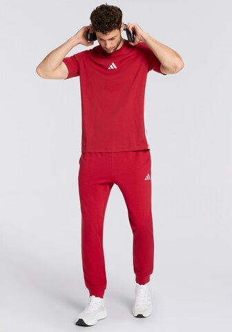 ADIDAS SPORTSWEAR Tapered Workout Pants in Red