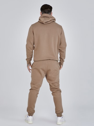 Tapered Pantaloni di SikSilk in marrone