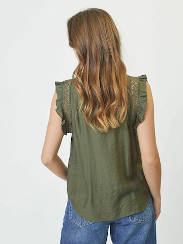 Haut ' Caryn' co'couture en vert