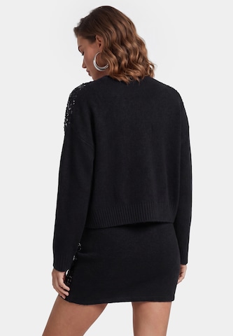 faina - Cárdigan en negro